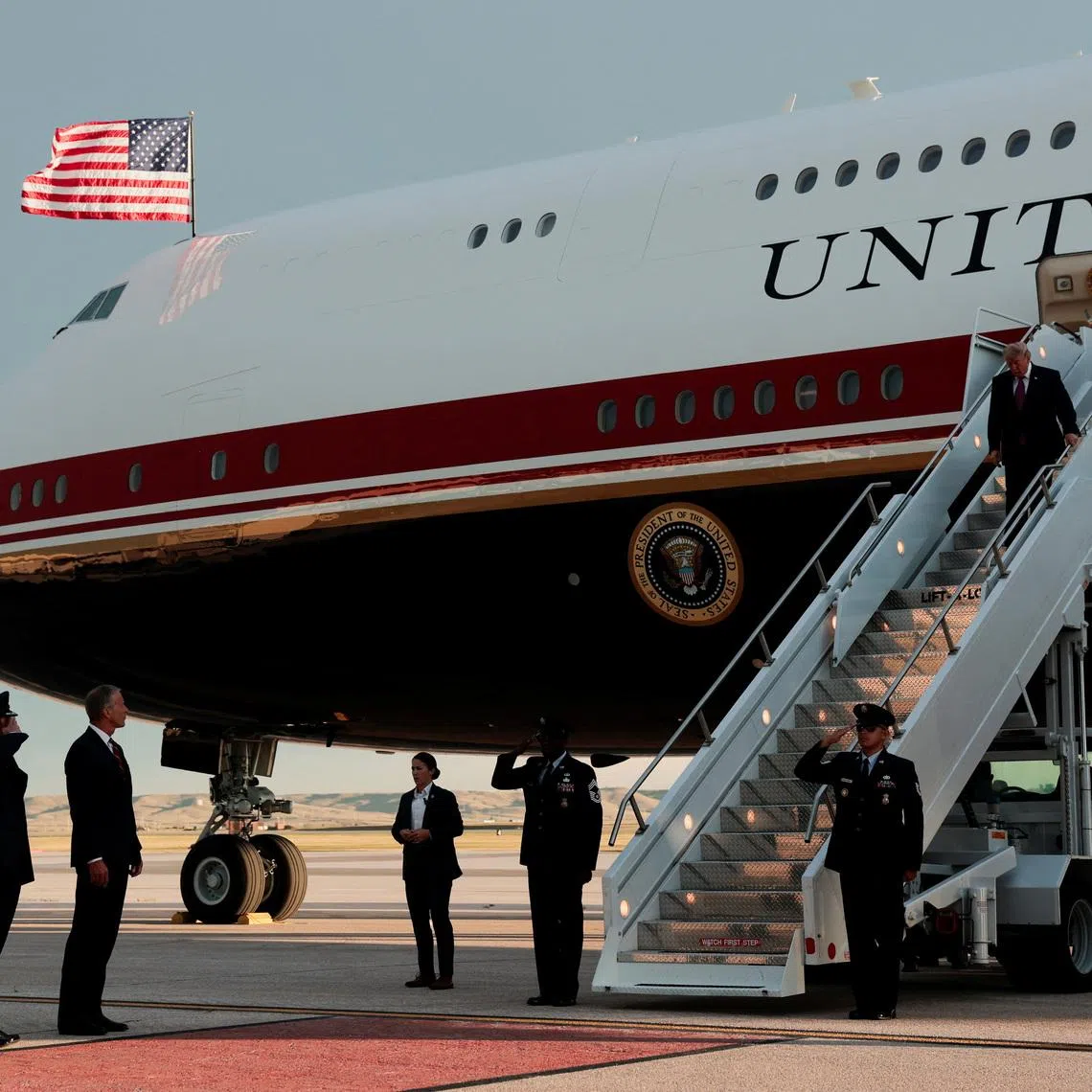 FILE PHOTO: U.S. President Donald Trump deboards the new Air Force One, a plane gifted by Qatar, upon arrival at Ellsworth Air Force Base in Belle Fourche-Cheyenne Valleys, South Dakota, U.S., July 3, 2026. REUTERS/Kylie Cooper/File Photo
