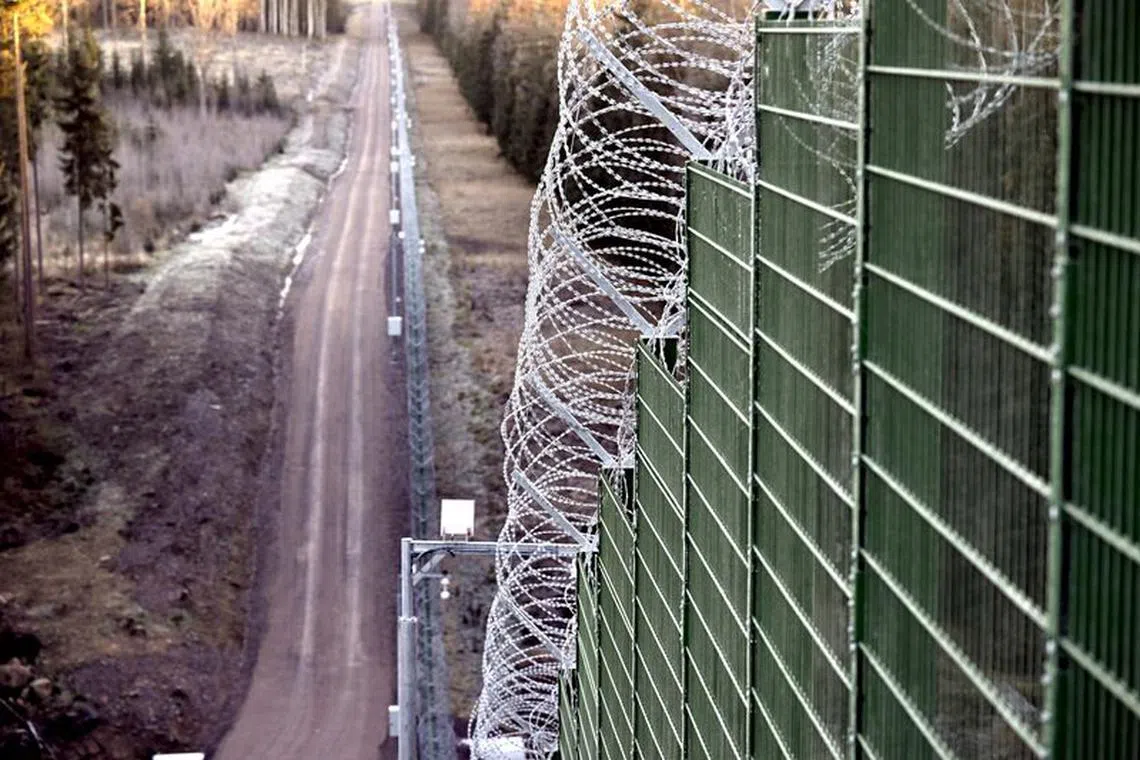 FILE PHOTO: A view of the pilot border fence during a media event of the Finnish Border Guard RAJA at the Finnish-Russian border in Imatra, Finland October 26, 2023. Lehtikuva/Jussi Nukari/via REUTERS/File photo