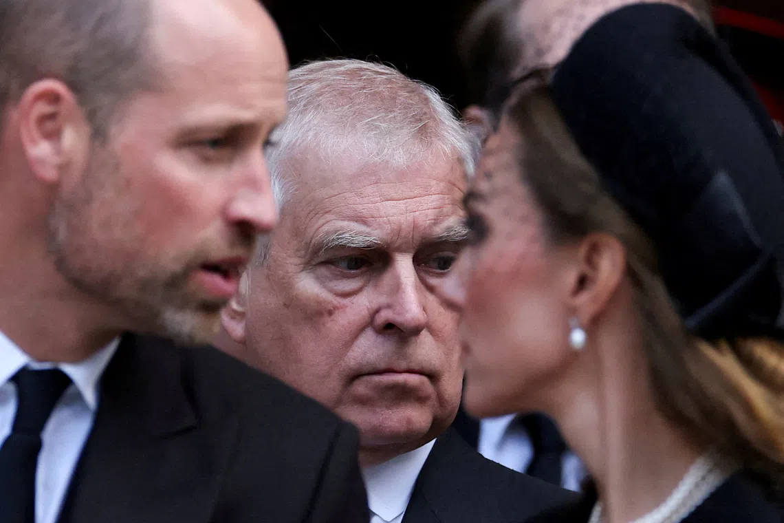 FILE PHOTO: Britain's Prince Andrew stands next to Prince William and his wife Catherine, Princess of Wales, as they leave Westminster Cathedral at the end of the Requiem Mass, on the day of the funeral of Britain's Katharine, Duchess of Kent, in London, Britain, September 16, 2025. REUTERS/Toby Melville/File Photo
