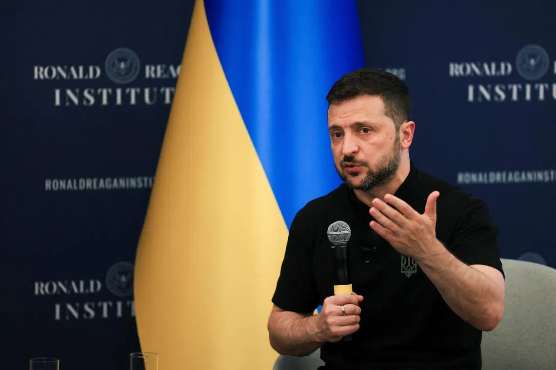 FILE PHOTO: Ukraine's President Volodymyr Zelenskiy delivers remarks at the Ronald Reagan Presidential Foundation and Institute on the sidelines of NATO's 75th anniversary summit in Washington, U.S., July 9, 2024. REUTERS/Kevin Mohatt/File Photo