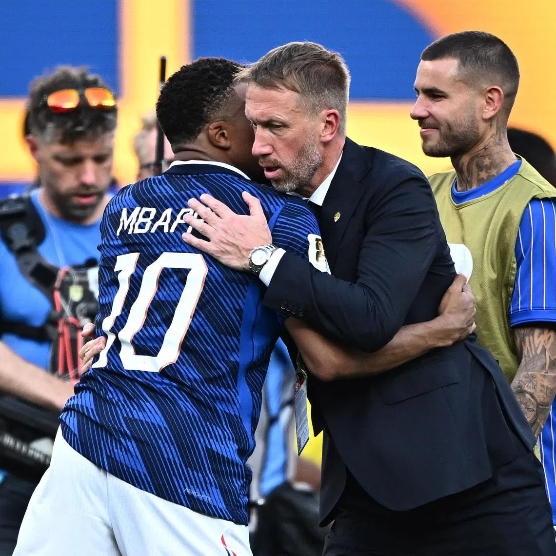 Soccer Football - FIFA World Cup 2026 - Round of 32 - France v Sweden - New York New Jersey Stadium, East Rutherford, New Jersey, U.S. - June 30, 2026 France's Kylian Mbappe and Sweden coach Graham Potter after the match REUTERS/Dylan Martinez