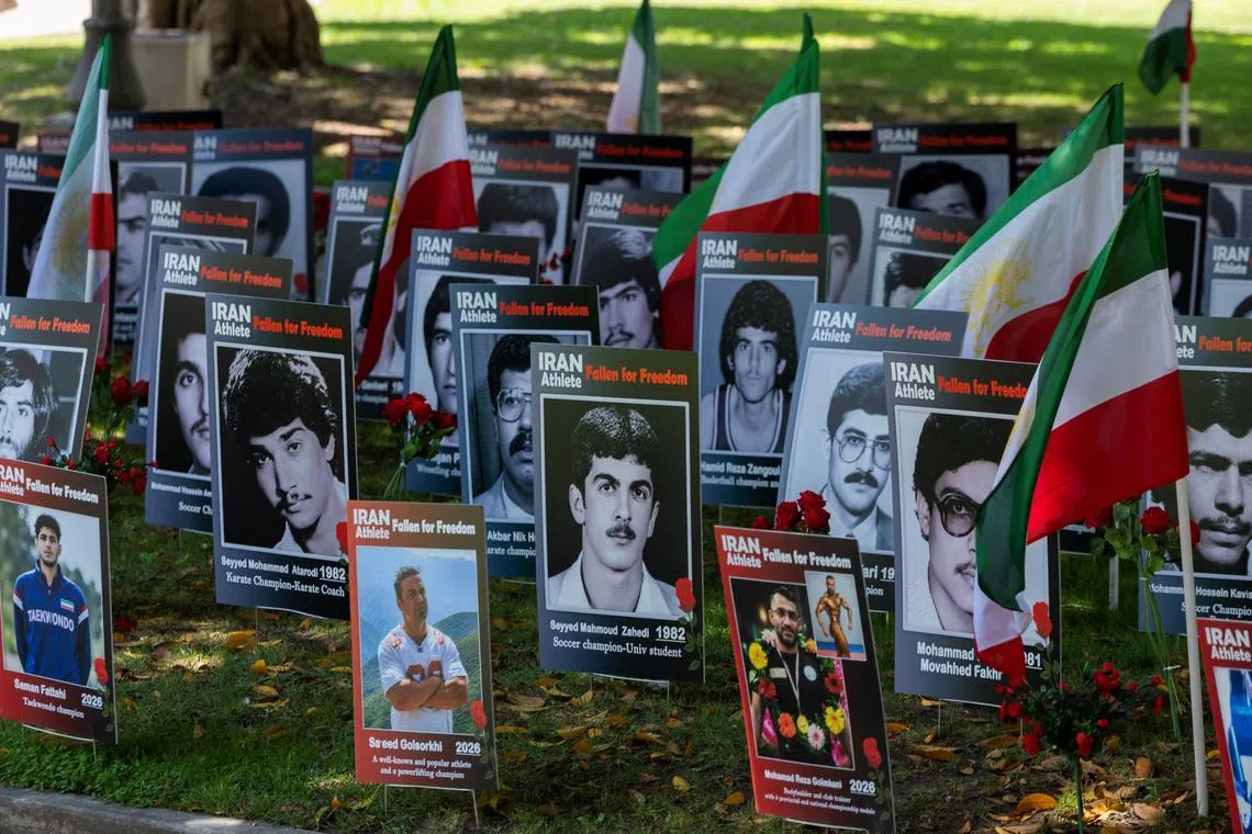 Images of former Iranian athletes are displayed, as protesters call on FIFA to suspend or expel Iran from international football, ahead of the FIFA World Cup 2026, in Los Angeles on June 10.