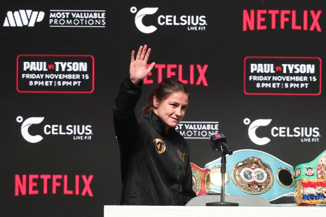 Nov 13, 2024; Irving, TX, USA;  Katie Taylor waves to fans before a press conference at The Pavilion at Toyota Music Factory. Mandatory Credit: Kevin Jairaj-Imagn Images/ File Photo