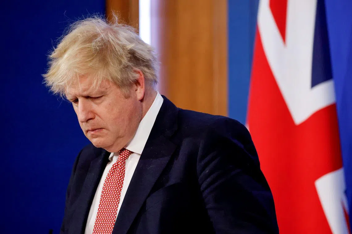 FILE PHOTO: British Prime Minister Boris Johnson attends a news conference to outline the government's new long-term coronavirus disease (COVID-19) pandemic plan, at Downing Street in London, Britain, February 21, 2022. Tolga Akmen/Pool via REUTERS