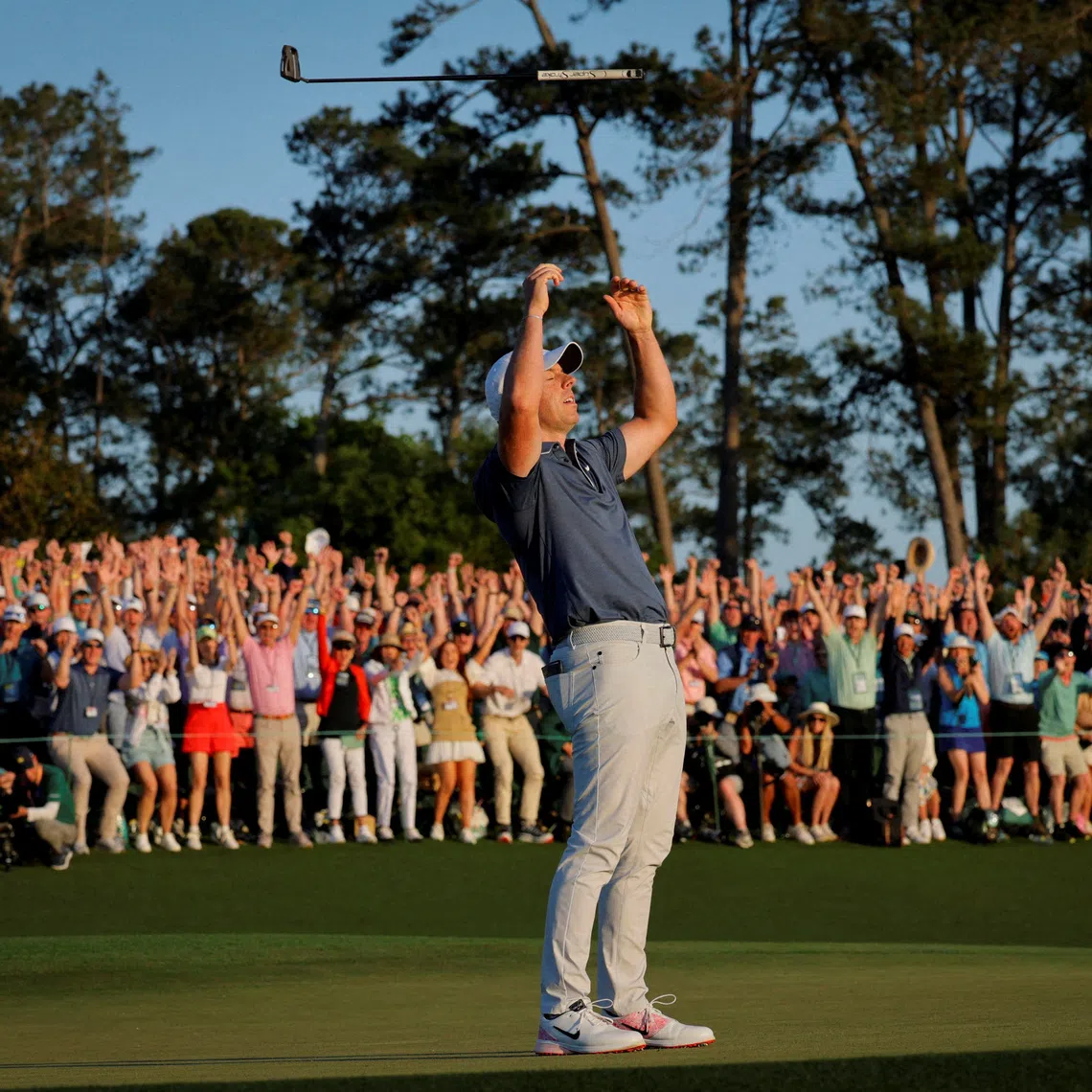 Golf - The Masters - Augusta National Golf Club, Augusta, Georgia, U.S. - April 13, 2025 Northern Ireland's Rory McIlroy celebrates on the 18th green and 1st play-off hole after winning The Masters and completing a career grand slam REUTERS/Brian Snyder