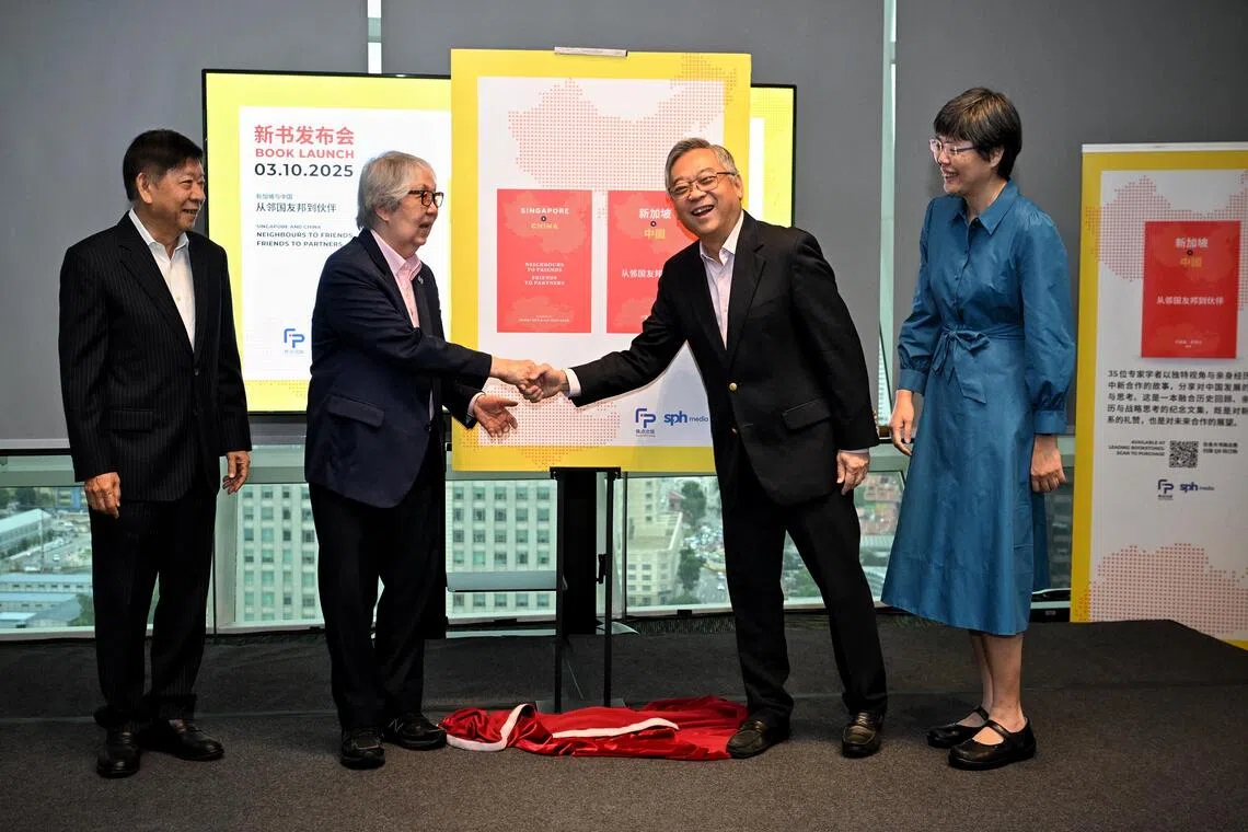 From left: SPH Media chairman Khaw Boon Wan, Professor Tommy Koh, Ambassador-at-Large at the Ministry of Foreign Affairs, DPM Gan Kim Yong and Lee Huay Leng, Editor-in-Chief of the Chinese Media Group at SPH Media launch the the book, Singapore and China: Neighbours to Friends, Friends to Partners on Oct 3, 2025.