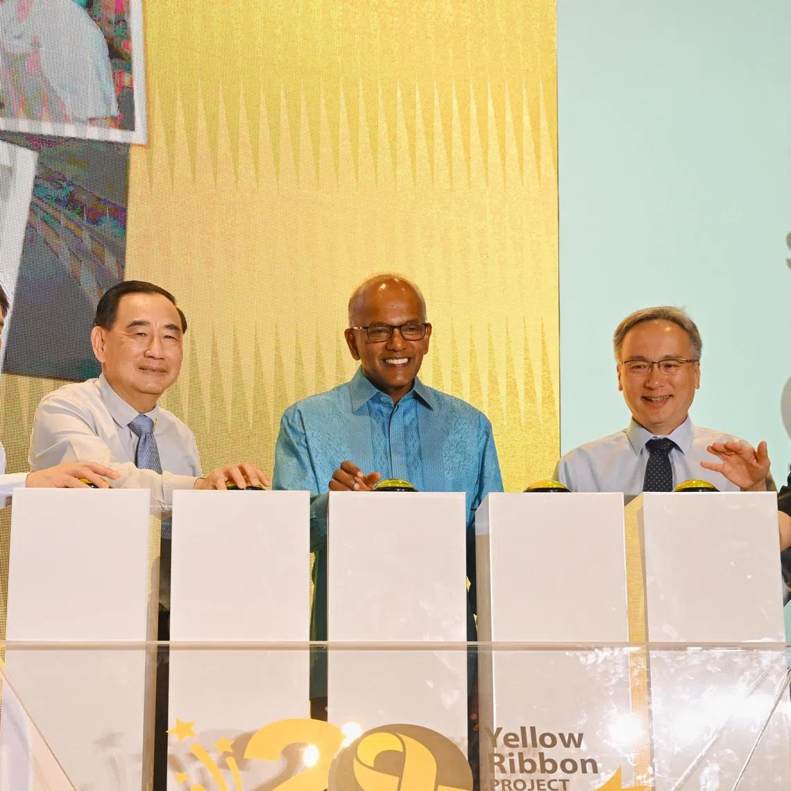 (From left) Mr Sunny Lee, Chief Executive Officer of the Yellow Ribbon Singapore, Mr Philip Tan, chairman of the Yellow Ribbon Singapore, Mr K Shanmugam, Minister for Law and Home Affairs, Mr Pang Kin Keong, Permanent Secretary of the Ministry of Home Affairs, and Ms Shie Yong Lee, Commisioner of Prisons, launching the 20th Anniversary of the Yellow Ribbon Project at the Singapore Prison Service and Yellow Ribbon Singapore Corporate Advance 2024 on Apr 30. 

ST PHOTO: AZMI ATHNI