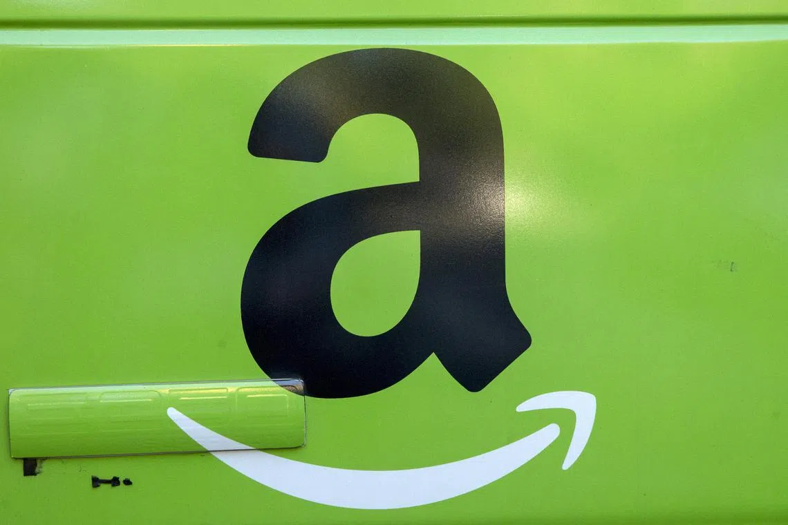 FILE PHOTO: The Amazon.com Inc. logo is seen on the side of a delivery truck in Brooklyn, New York, August 28, 2015. REUTERS/Brendan McDermid/File Photo