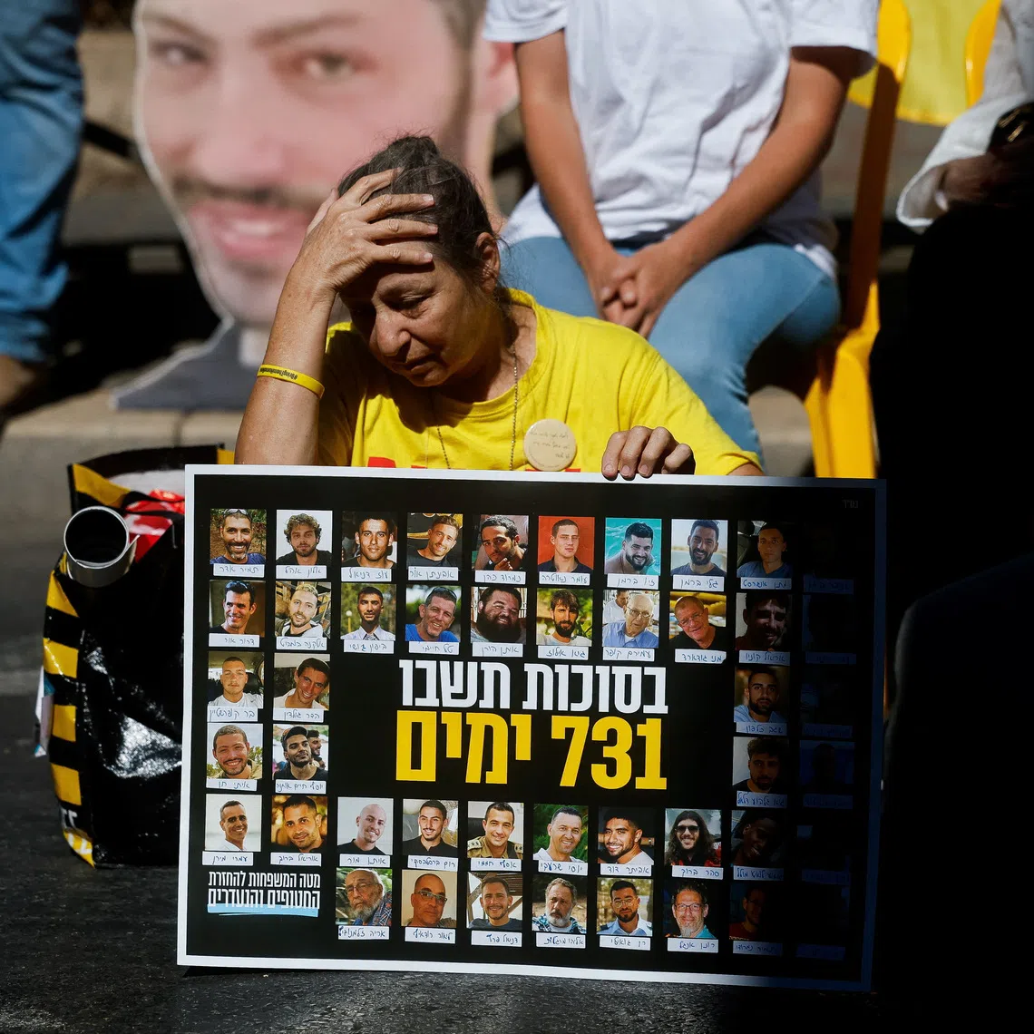 A woman reacts as families of Israeli hostages and supporters protest outside Israeli Prime Minister Benjamin Netanyahu's residence, marking the two-year anniversary of the deadly October 7, 2023 attack on Israel by Hamas from Gaza, in Jerusalem, October 7, 2025. REUTERS/Ammar Awad