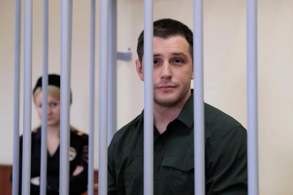 A 2019 photo shows Trevor Reed in Russian detention, accused of assaulting police officers.
