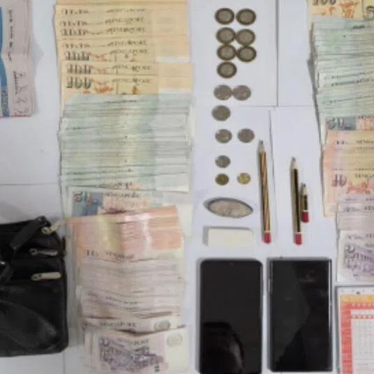 More than $50,000 in cash and several mobile devices were seized.