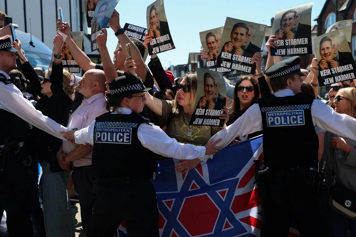 Scared and angry British Jews demand more from government after knife attack