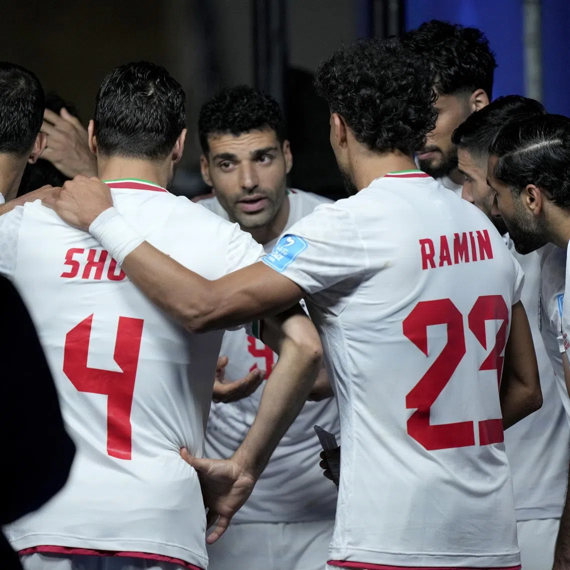Iran captain Mehdi Taremi of Iran speaks to his teammates during a World Cup match on June 26.