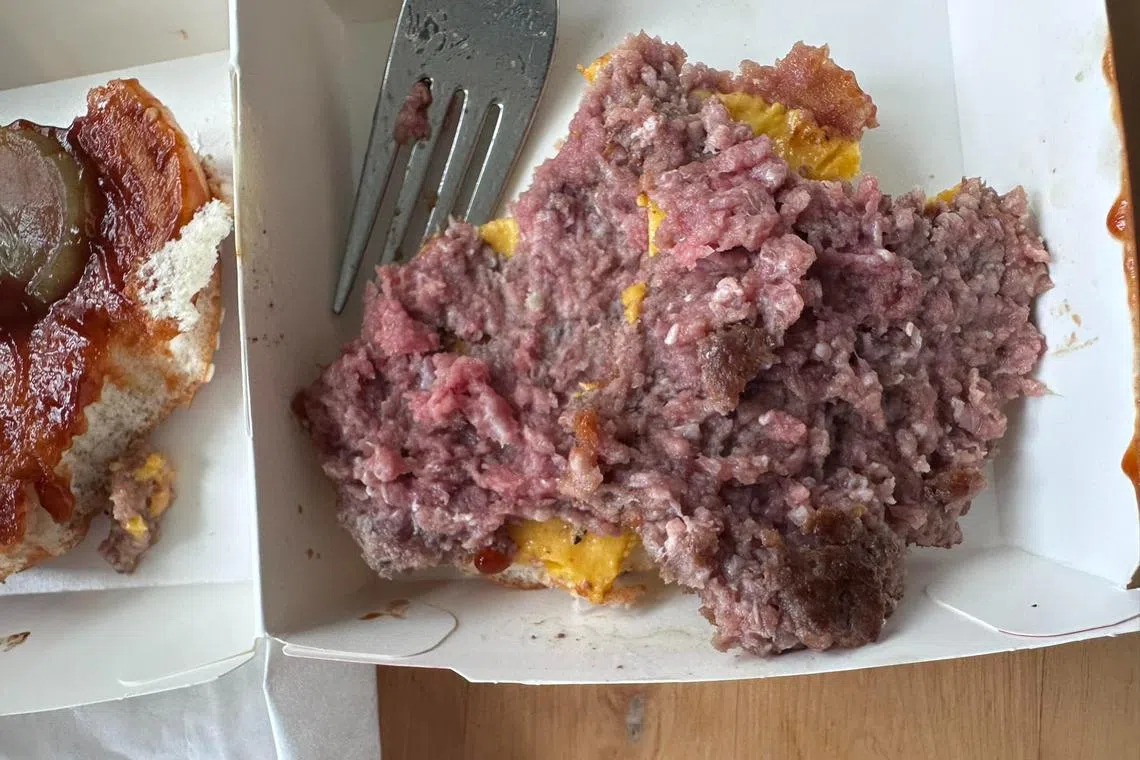 The woman said the burger she consumed had what seemed like an “80 per cent” undercooked patty.