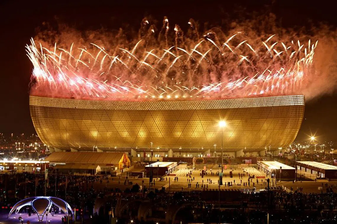 FILE PHOTO: Soccer Football - FIFA World Cup Qatar 2022 - Final - Argentina v France - Lusail Stadium, Lusail, Qatar - December 18, 2022 General view of a pyrotechnic display pictured from outside the stadium after the match REUTERS/Hamad I Mohammed /File Photo