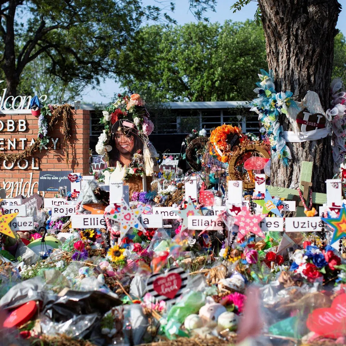 A memorial set up outside Robb Elementary School in Uvalde, Texas, in July 2022, after a shooting that killed 19 elementary pupils and two teachers.  
