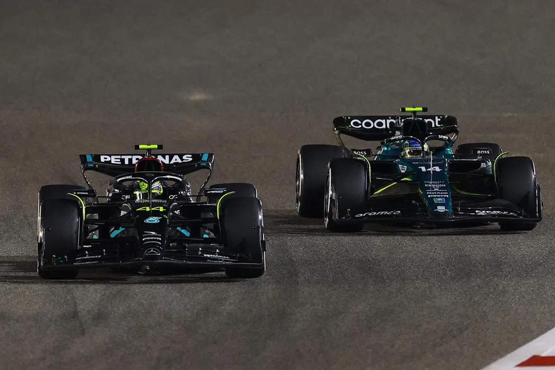 Mercedes' Lewis Hamilton and Aston Martin's Fernando Alonso in action during the Bahrain Grand Prix on Sunday.