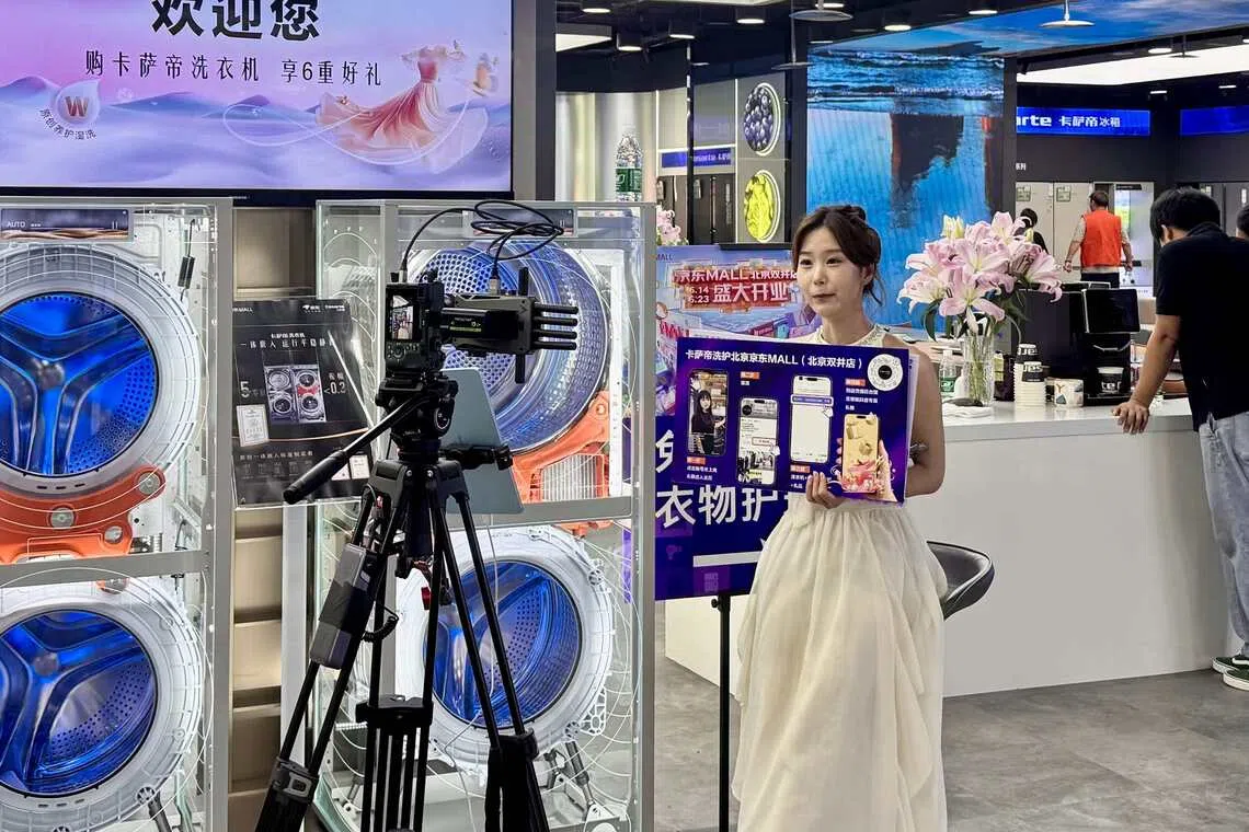A live-stream host selling products online at JD Mall in Beijing on June 18.