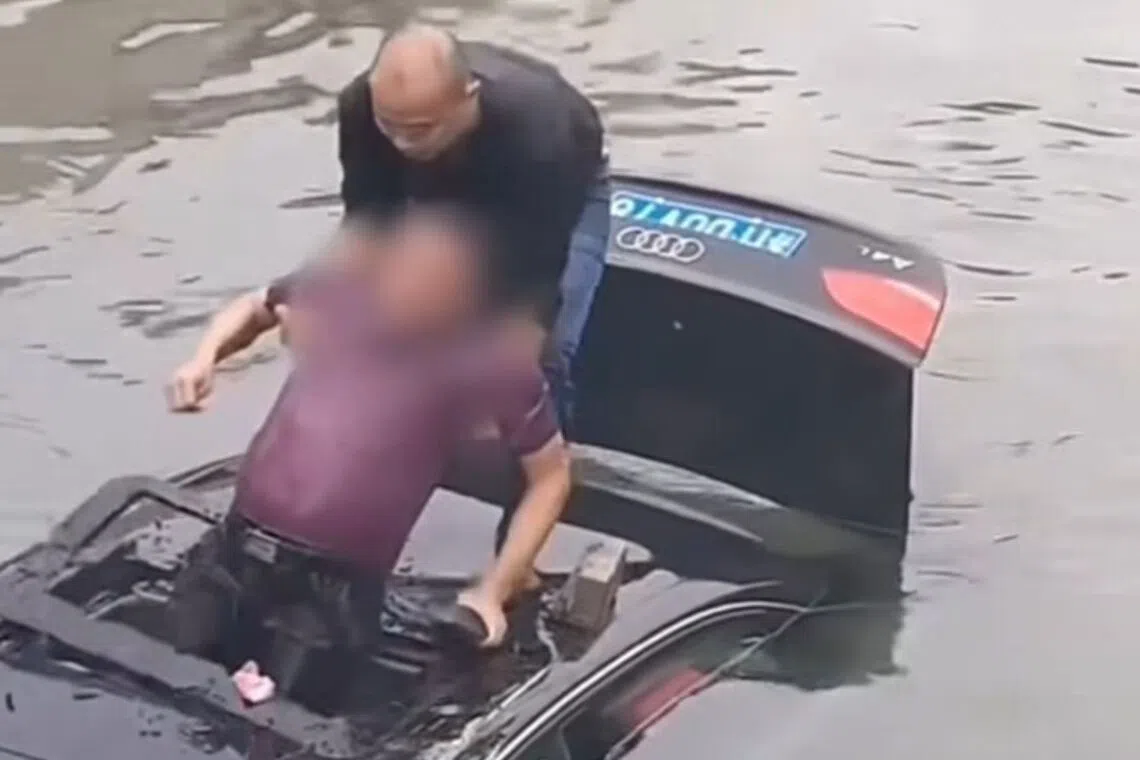 Mr Di Shuangcheng jumped into a river in Taizhou on Oct 14 to rescue a driver trapped in his car.
