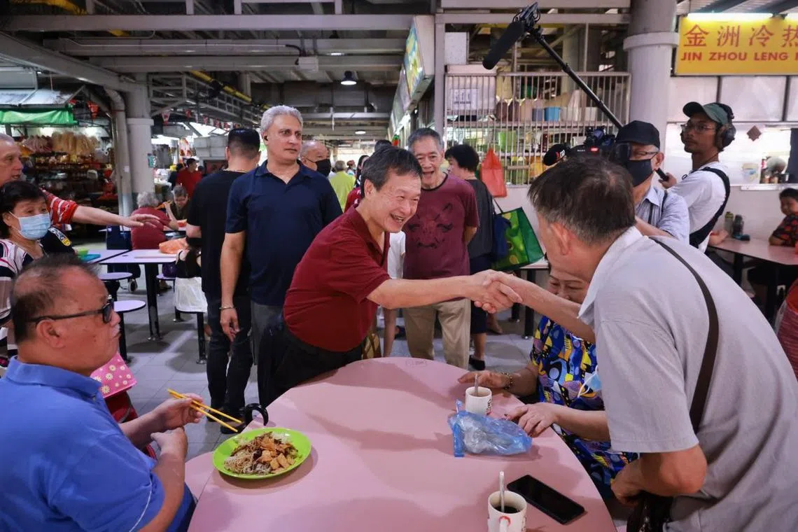 Presidential hopeful Tan Kin Lian meeting residents at Jurong West 505 Market & Food Centre, on Aug 15, 2023.