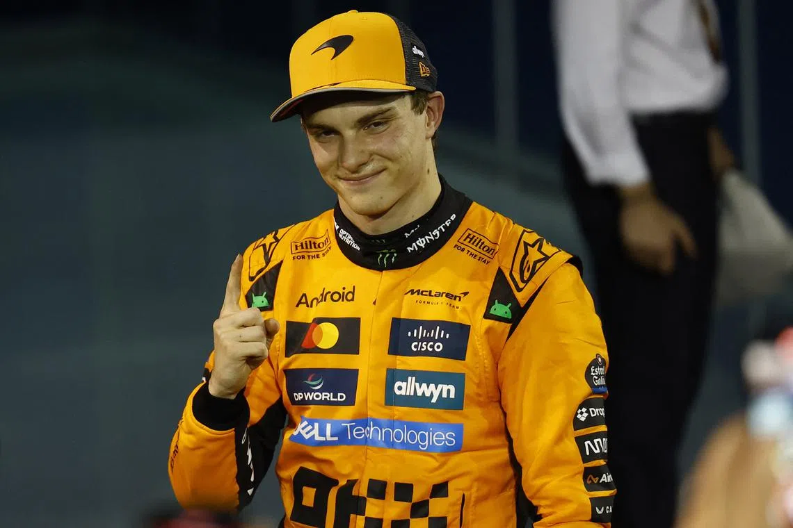 Formula One F1 - Bahrain Grand Prix - Bahrain International Circuit, Sakhir, Bahrain - April 13, 2025 McLaren's Oscar Piastri celebrates after winning the Bahrain Grand Prix REUTERS/Rula Rouhana/ File Photo