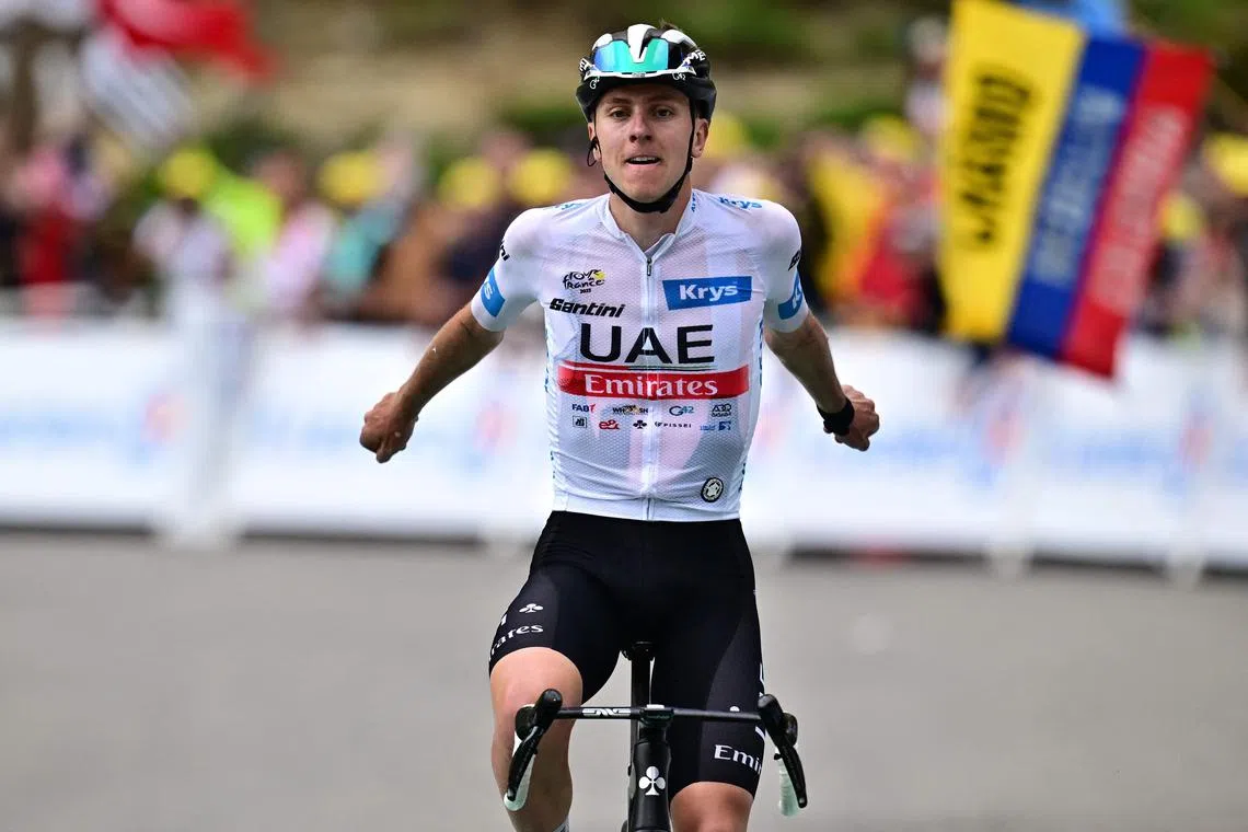 UAE Team Emirates' Slovenian rider Tadej Pogacar cycles to the finish line to win the 6th stage of the 110th edition of the Tour de France cycling race, 145 km between Tarbes and Cauterets-Cambasque, in the Pyrenees mountains in southwestern France, on July 6, 2023. (Photo by Marco BERTORELLO / AFP)