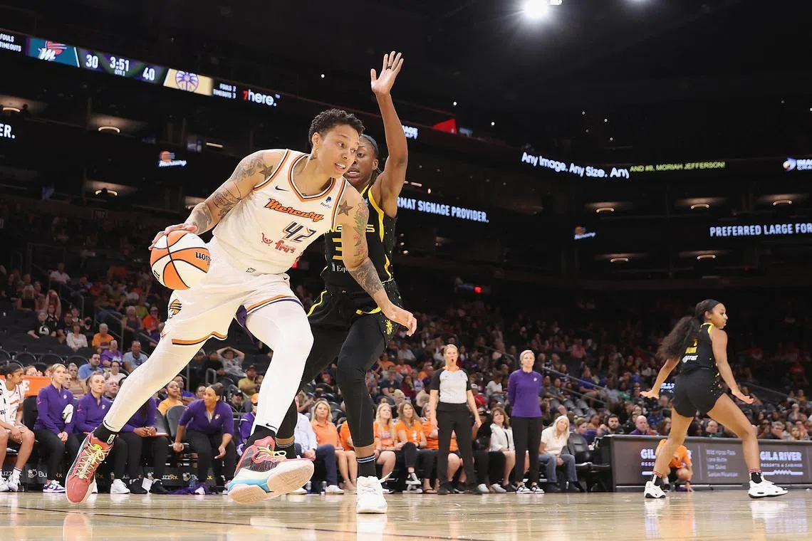 Brittney Griner of the Phoenix Mercury driving to the basket against the Los Angeles Sparks in their WNBA game on May 12, 2023 in Phoenix, Arizona. 