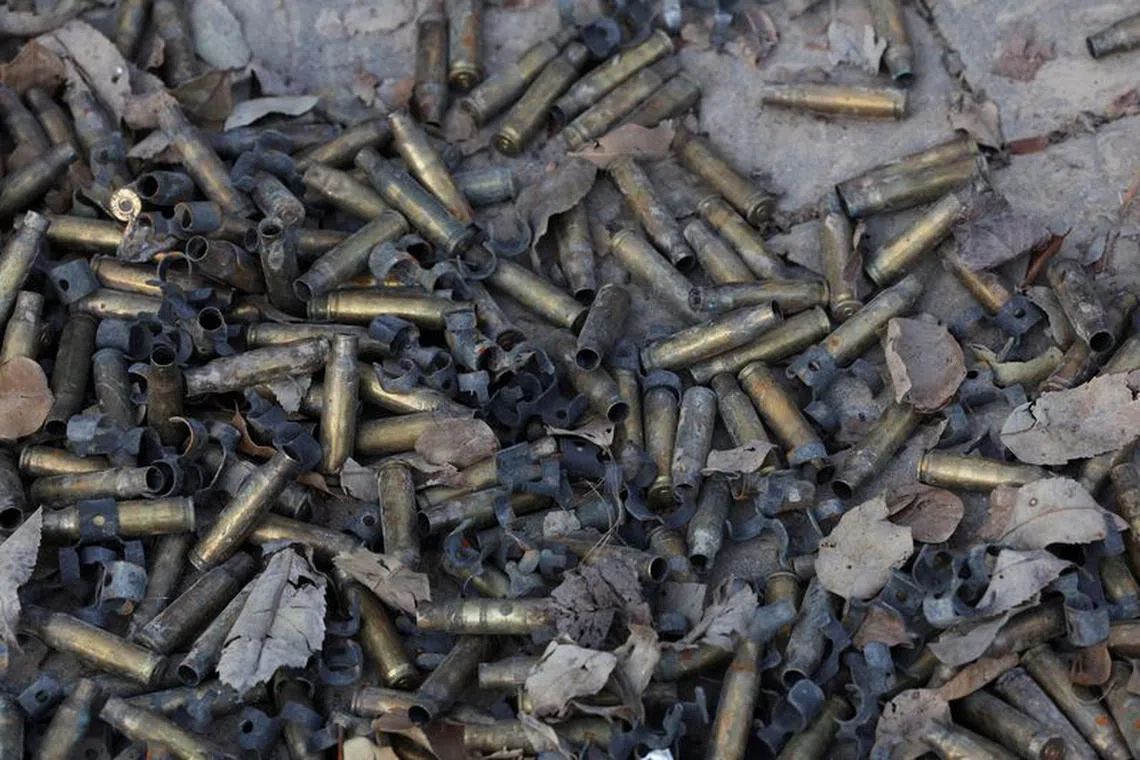 View shows bullet shells, in the aftermath of a mass infiltration by Hamas gunmen from the Gaza Strip, in Kibbutz Beeri in southern Israel, October 14, 2023. REUTERS/Violeta Santos Moura