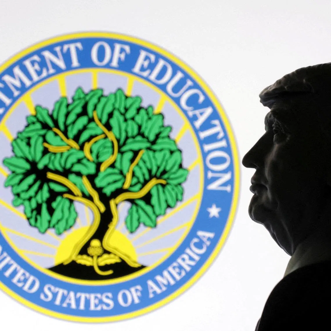 FILE PHOTO: A 3D-printed miniature model of U.S. President Donald Trump with the U.S. Department of Education logo in the background is seen in this illustration taken April 23, 2025. REUTERS/Dado Ruvic/Illustration/File Photo