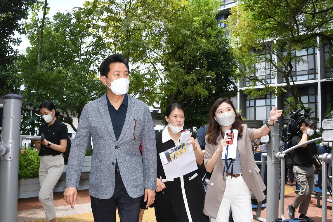Seoul Mayor Oh Se-hoon (grey jacket) visiting Kampung Admiralty in Singapore on July 30, 2020. He said Seoul will pursue a bid for the 2036 Summer Olympic Games without reviving efforts to co-host an Olympics with the North Korean capital of Pyongyang.