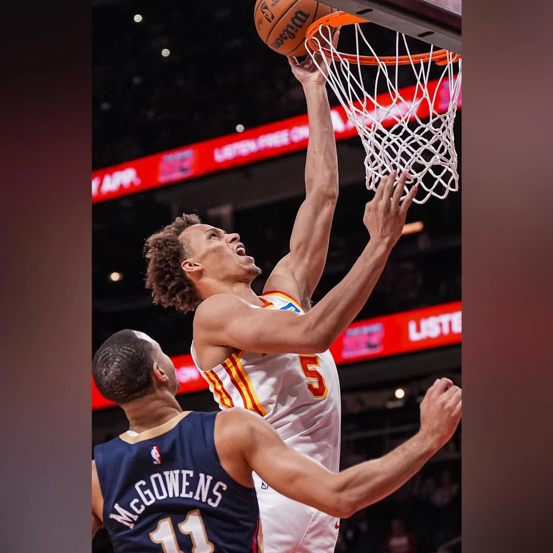 Atlanta Hawks guard Dyson Daniels scoring in their win over New Orleans Pelicans on Jan 7 as Bryce McGowens looks on. 