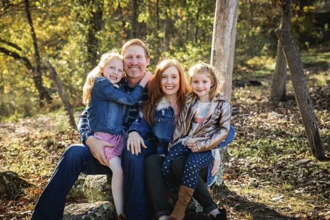 In an undated family photo from Saltz Mongeluzzi Bendesky, Philip Paxson, 47, with his wife, Alicia, and their daughters. Paxson's family said in a lawsuit that he was following Google Maps directions last year when he drove off the bridge, plunged into a creek and drowned. (Saltz Mongeluzzi Bendesky via The New York Times) -- NO SALES; FOR EDITORIAL USE ONLY WITH NYT STORY GOOGLE MAPS LAWSUT BY JENNY GROSS FOR SEPT. 21, 2023. ALL OTHER USE PROHIBITED. --