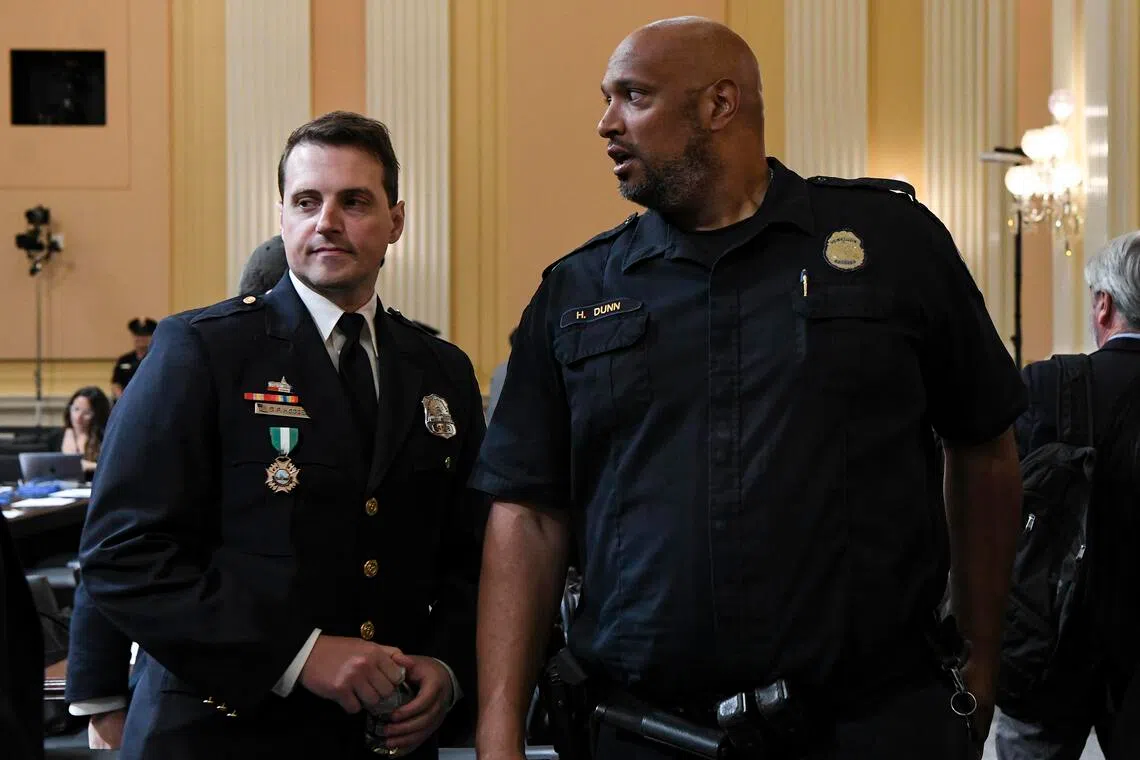 A 2022 photo showing police officers  Daniel Hodges (left) and Harry Dunn.