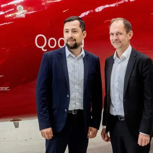 Danish Defence Minister Jeppe Bruus (right) and Greenland's Foreign Minister Mute B Egede posing in front of an Air Greenland aircraft on June 22 at Nuuk Airport.