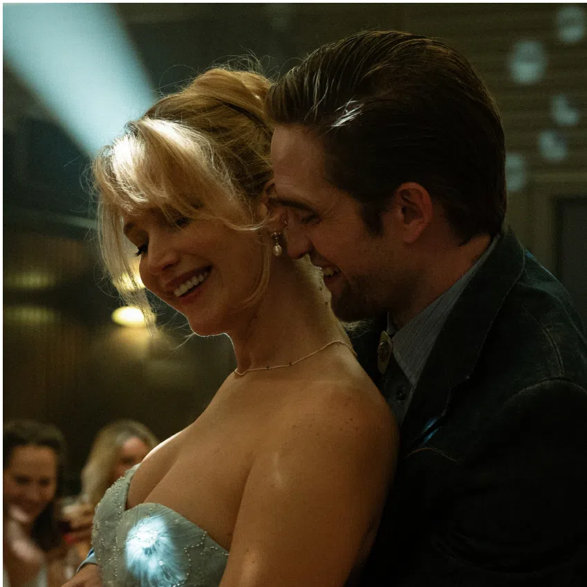 (From left) Jennifer Lawrence and Robert Pattinson in Die My Love; George Clooney and Adam Sandler in Jay Kelly.