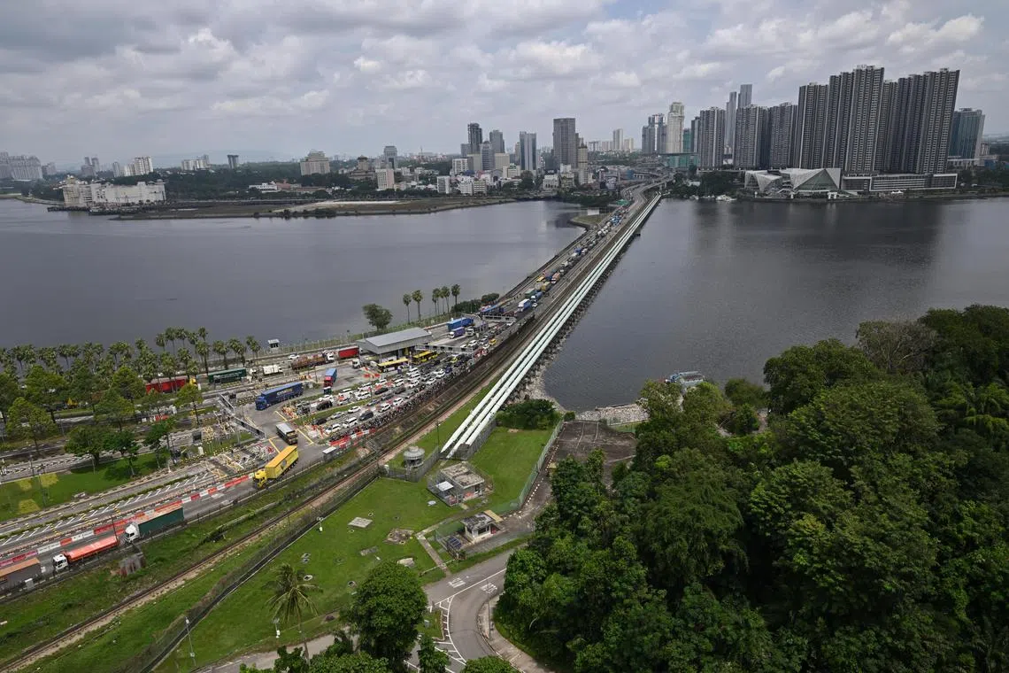 ST20240315_202486187637/ilwoodlands17/Shintaro Tay/ Isabelle Liew/ 

The view of the surrounding area around the causeway linking Malaysia to Singapore, as seen on March 15, 2024.

About 44ha of land will be reclaimed by 2029 as part of works to expand the Woodlands Checkpoint to five times its size. JTC Corporation said that about 34ha of land will be reclaimed on the western side of the Causeway linking Malaysia and Singapore, and 10ha on the eastern side. Although the report studied a larger reclamation area - 36.4ha on the western side and 30.2ha on the eastern end - JTC said it decided on a smaller profile to minimise the environmental impact, and to maximise the distance between the Mandai Mangrove and Mudflat park and the reclaimed land. Reclamation work on both sides is tentatively scheduled to start in the third quarter of 2024 and is estimated to be completed by 2029.