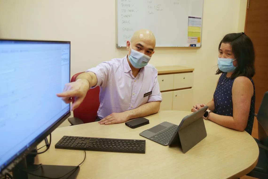 A mock consultation session using CARES-ML with Associate Professor Hairil Rizal, Senior Consultant, Anesthesiology, SGH, before a surgery at the Pre-Admissions Centre on June 28, 2023.