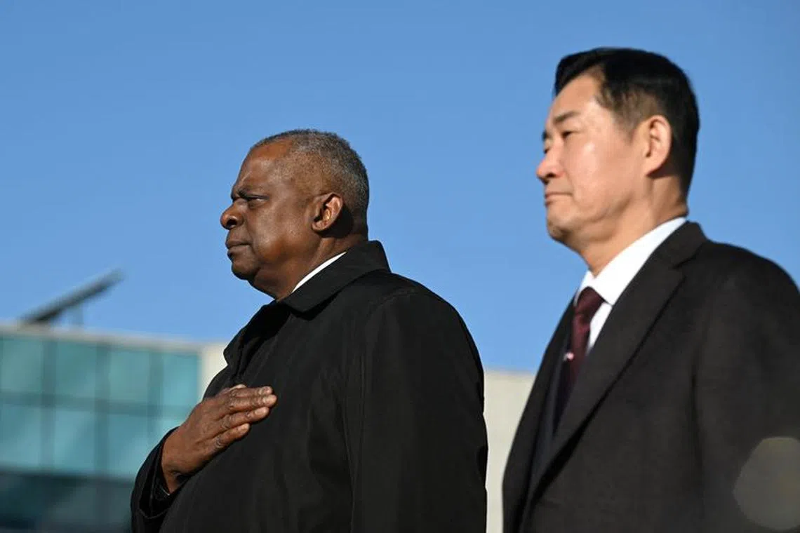 US Secretary of Defense Lloyd Austin and South Korean Defence Minister Shin Won-sik attend a welcome ceremony before their annual security meeting at the Defence Ministry in Seoul, South Korea on November 13, 2023.   JUNG YEON-JE/Pool via REUTERS