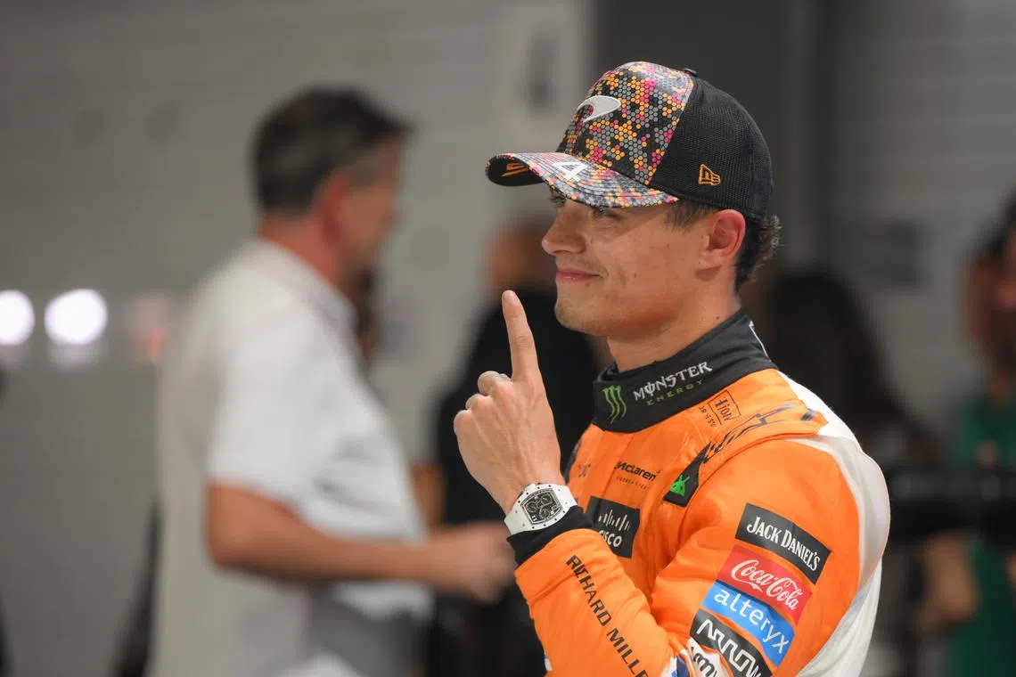 British driver, Lando Norris of McLaren F1 Team gestures after placing in pole position, during the qualifying round of the Formula One Singapore Airlines Singapore Grand Prix, at the Marina Bay street circuit, on Sept 21, 2024.