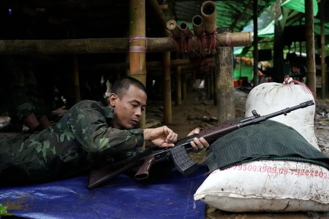 A new member of the People's Defence Force undergoing basic military training at a secret jungle camp in Mon State, Myanmar, on July 9.