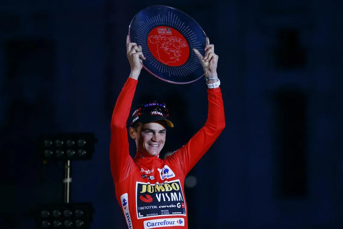 FILE PHOTO: Cycling - Vuelta a Espana - Stage 21 - Hipodromo de la Zarzuela to Madrid - Spain - September 17, 2023 Team Jumbo–Visma's Sepp Kuss celebrates on the podium after winning Vuelta a Espana REUTERS/Susana Vera/File Photo