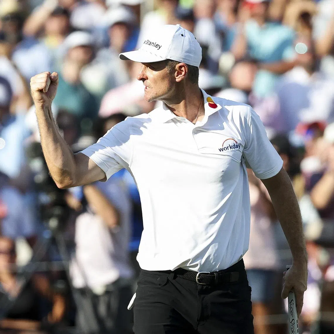 Justin Rose of England celebrating after making a birdie on the 18th hole during a play-off against J.J. Spaun during the final round of the FedEx St. Jude Championship on Aug 10.