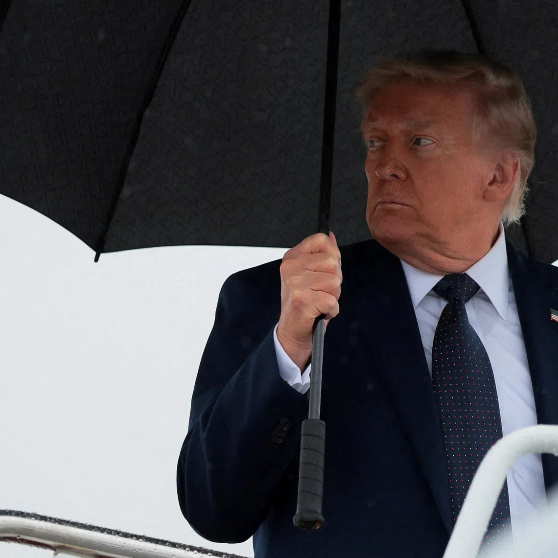 U.S. President Donald Trump looks on as he boards Air Force One en route to Morristown Airport in Morristown, New Jersey, at Joint Base Andrews, Maryland, U.S., May 22, 2026. REUTERS/Kylie Cooper