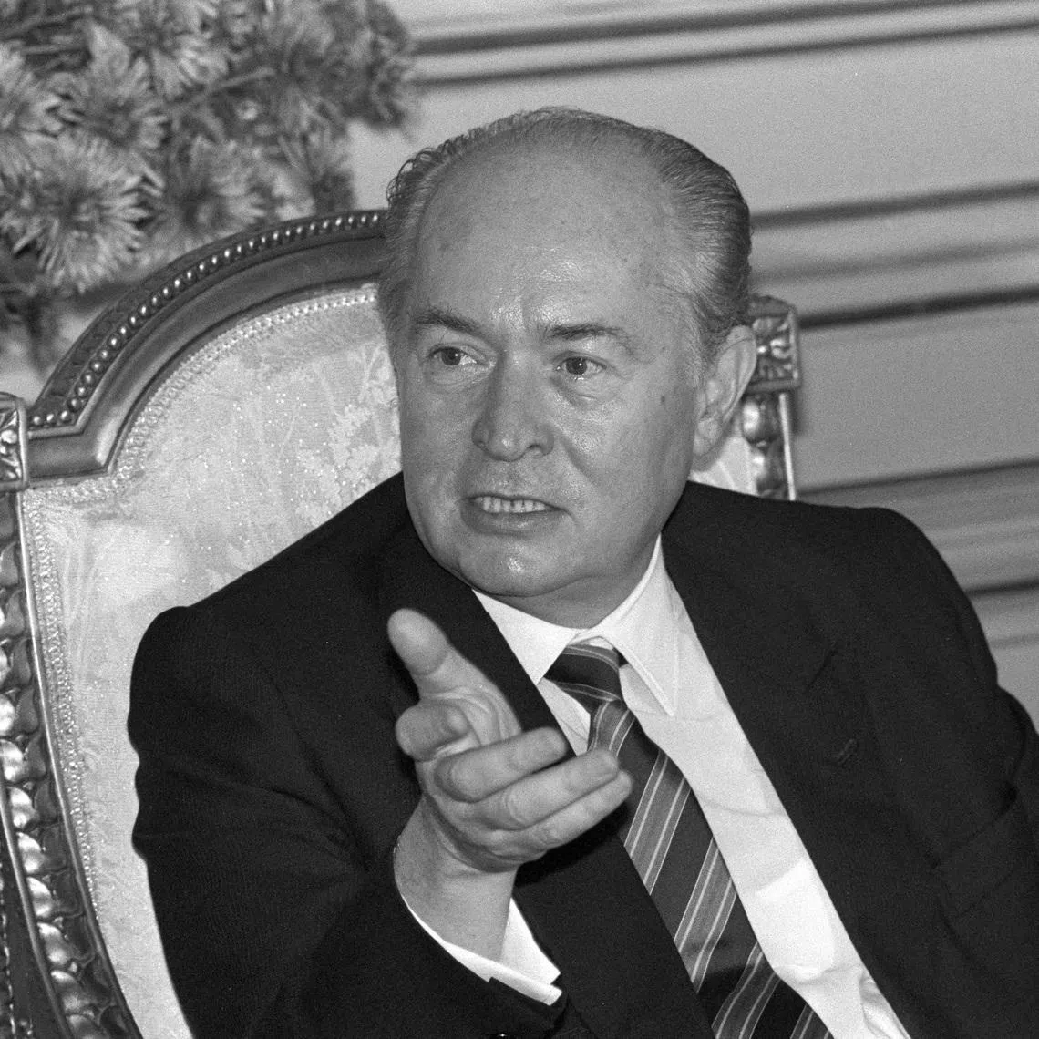 FILE PHOTO: Cypriot President George Vassiliou speaks at a press conference about improving trade relations between Cyprus and Egypt in Cairo on November 22, 1989. REUTERS/Aladin Abdel-nabi 90001033/File Photo