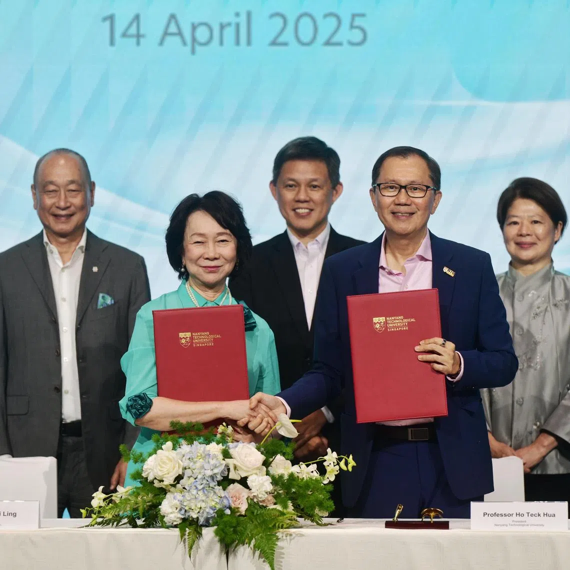 Education Minister Chan Chun Sing (third from left) at a signing ceremony to formalise a $110 million gift from UOB and the Wee Foundation to NTU. With him are (from left) UOB deputy chairman and chief executive Wee Ee Cheong, Wee Foundation director Wee Wei Ling, NTU president Ho Teck Hua and NTU board chair Goh Swee Chen. The gift, donated in honour of the late Dr Wee Cho Yaw, is the second-largest sum that the university has received.