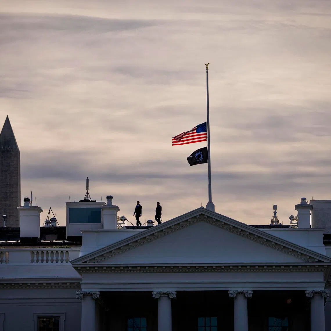 The American flag flies at half staff in honour of former Vice-President Dick Cheney at the White House on Nov 4.  