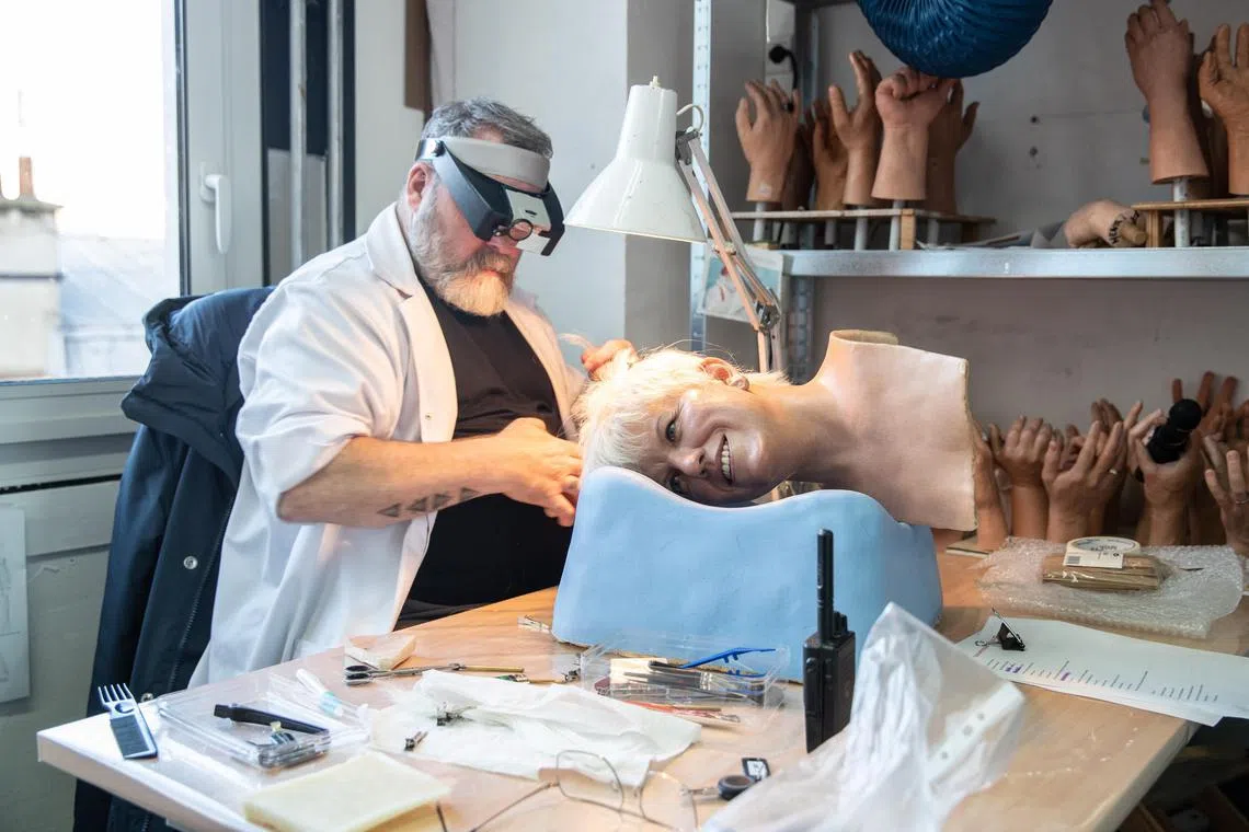 A hairdresser replaces the hair on the wax figure of French actress and comedian Mimie Mathy in the facilities dedicated to the restoration of statues at the Grevin Museum in Paris, France. The wax museum was founded in 1882 by the journalist Arthur Meyer, the sculptor Alfred Grevin and the economist Gabriel Thomas and houses wax statues of various French and foreign personalities. Six months are necessary to create each wax figure. 