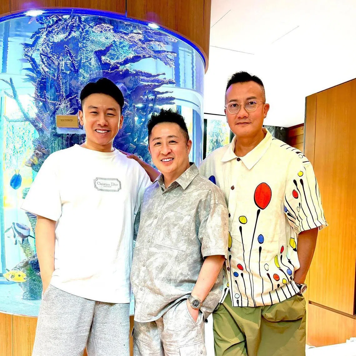 (From right) Chen Hanwei with Patrick Low and Low's son Ryan Low