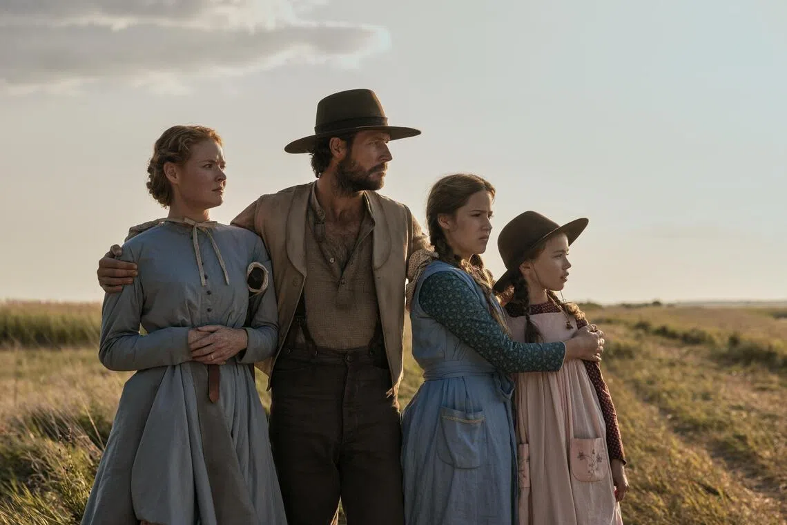 Little House On The Prairie stars (from left) Crosby Fitzgerald as Caroline Ingalls, Luke Bracey as Charles Ingalls, Skywalker Hughes as Mary Ingalls, Alice Halsey as Laura Ingalls.