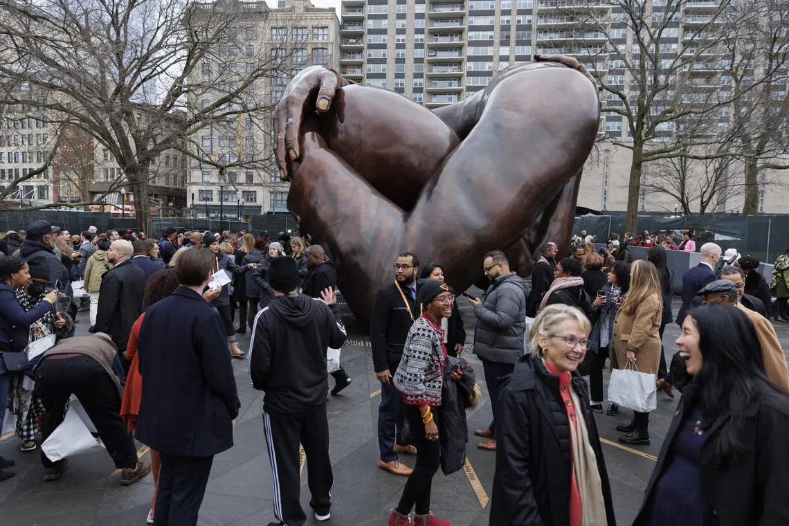 The Embrace, a statue to remember civil rights activist Martin Luther King Jr, is unveiled in Boston on Jan 13, 2023.